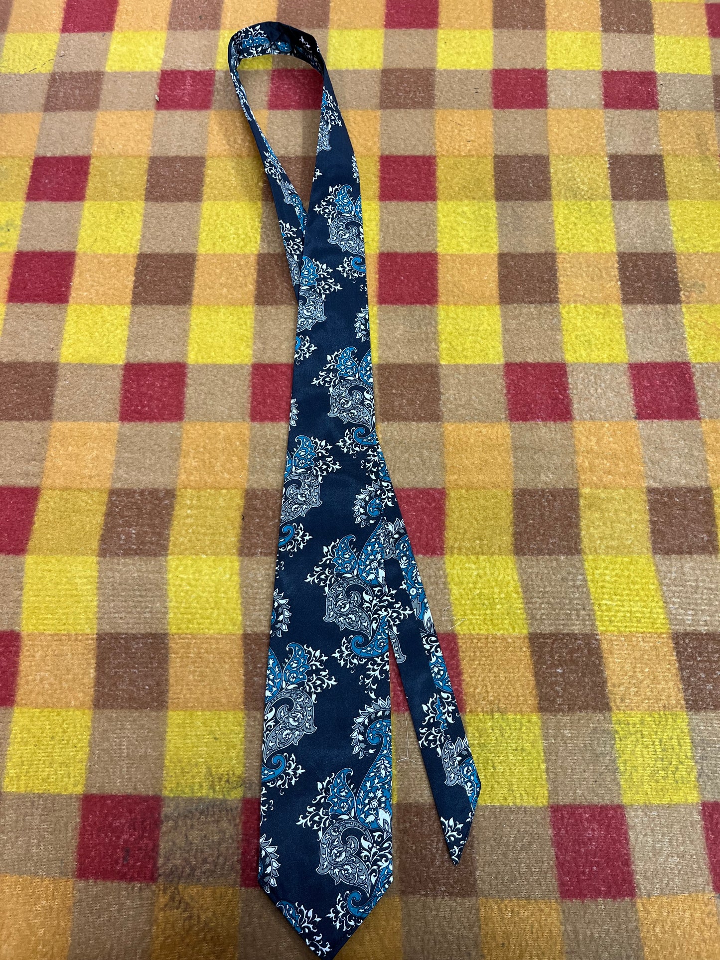60” Necktie, 12x12” pocket square. Black/teal paisley
