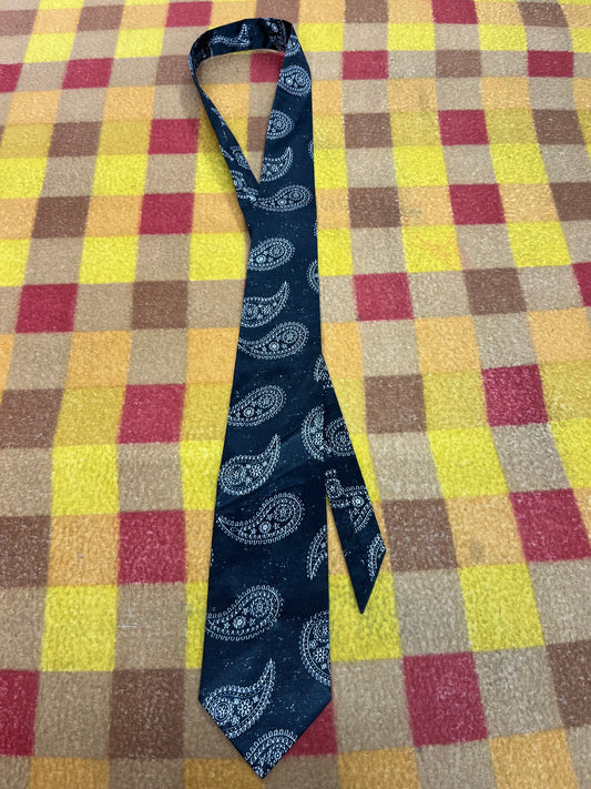 60” Necktie, 12x12” pocket square. Black/white paisley