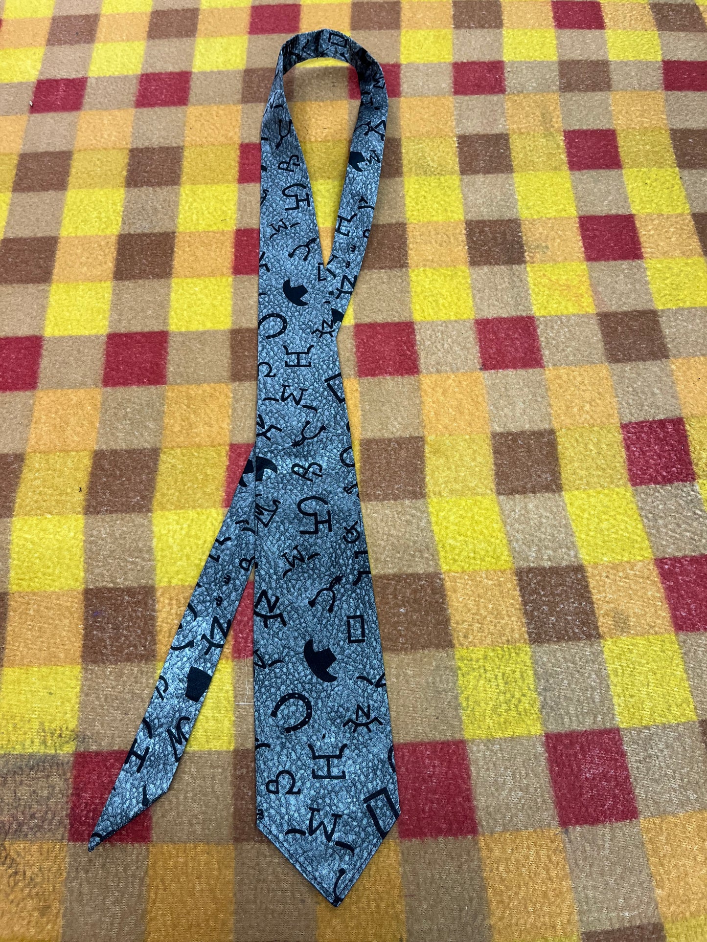 60” Necktie, 12x12” pocket square. Silver brands