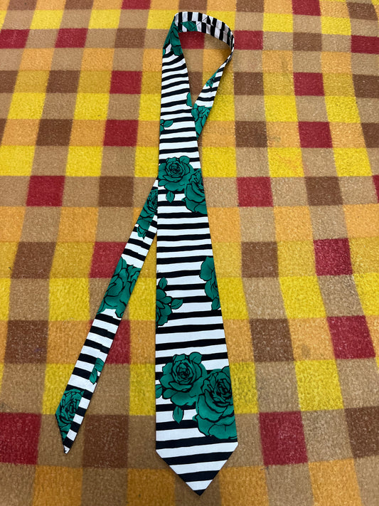 60” Necktie, 12x12” pocket square. Black/white stripe / green roses