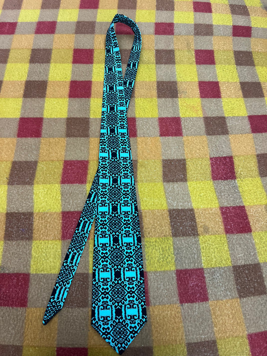 60” Necktie, 12x12” pocket square. Turquoise/ black diamond