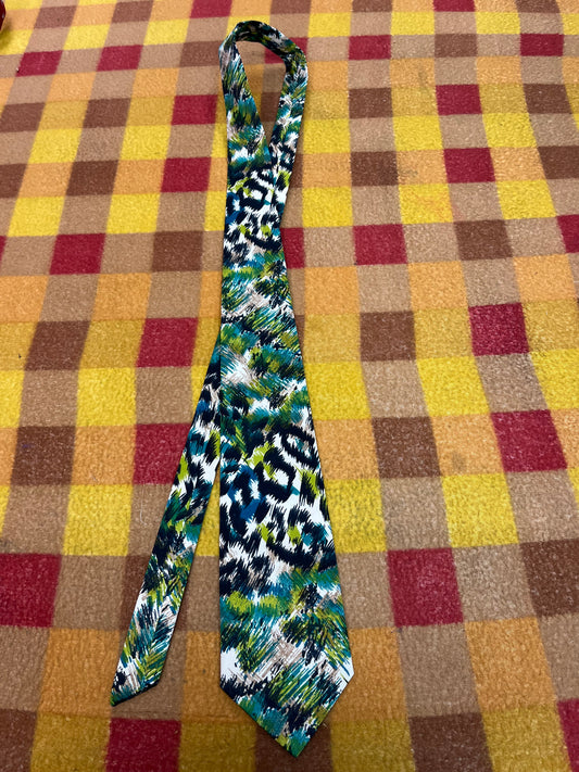 60” Necktie, 12x12” pocket square. Blue/green animal print