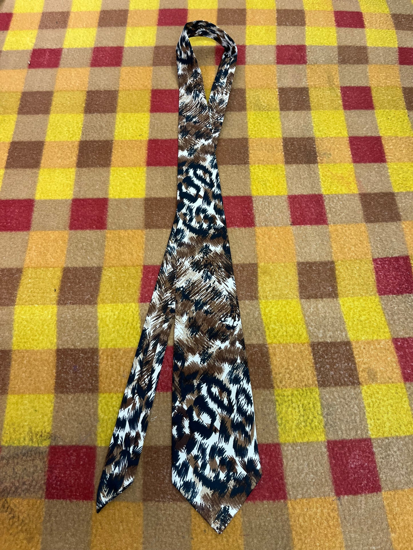 60” Necktie, 12x12” pocket square.brown/black animal print