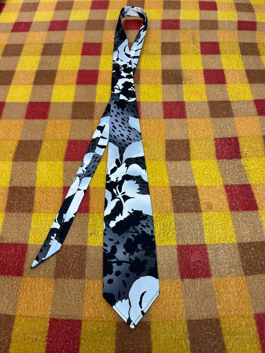 60” Necktie, 12x12” pocket square. Black/White floral