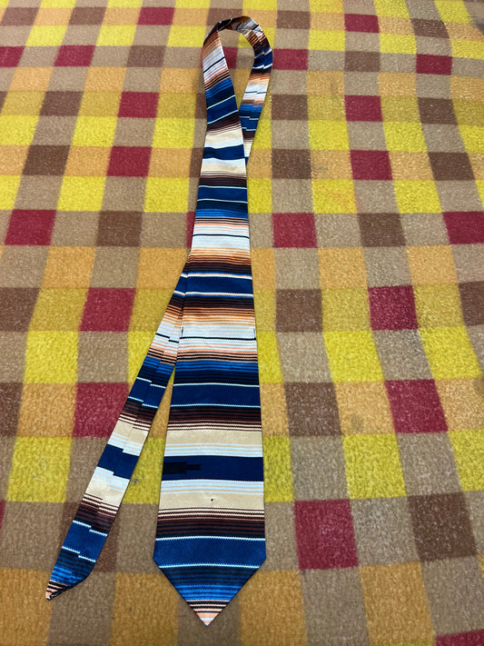 60” Necktie, 12x12” pocket square. Navy/brown/tan sarape